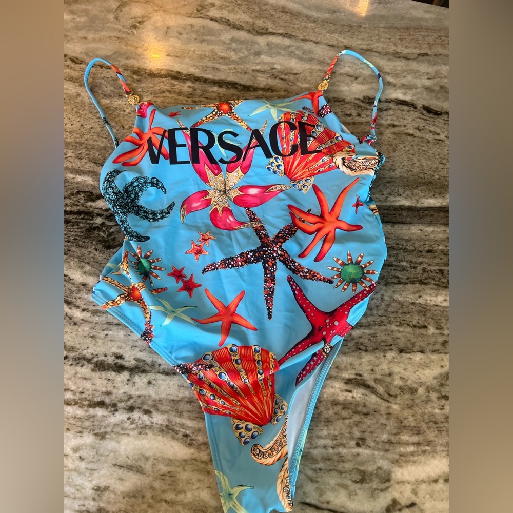 Versace women’s bathing suit size large new with tags. Never worn.